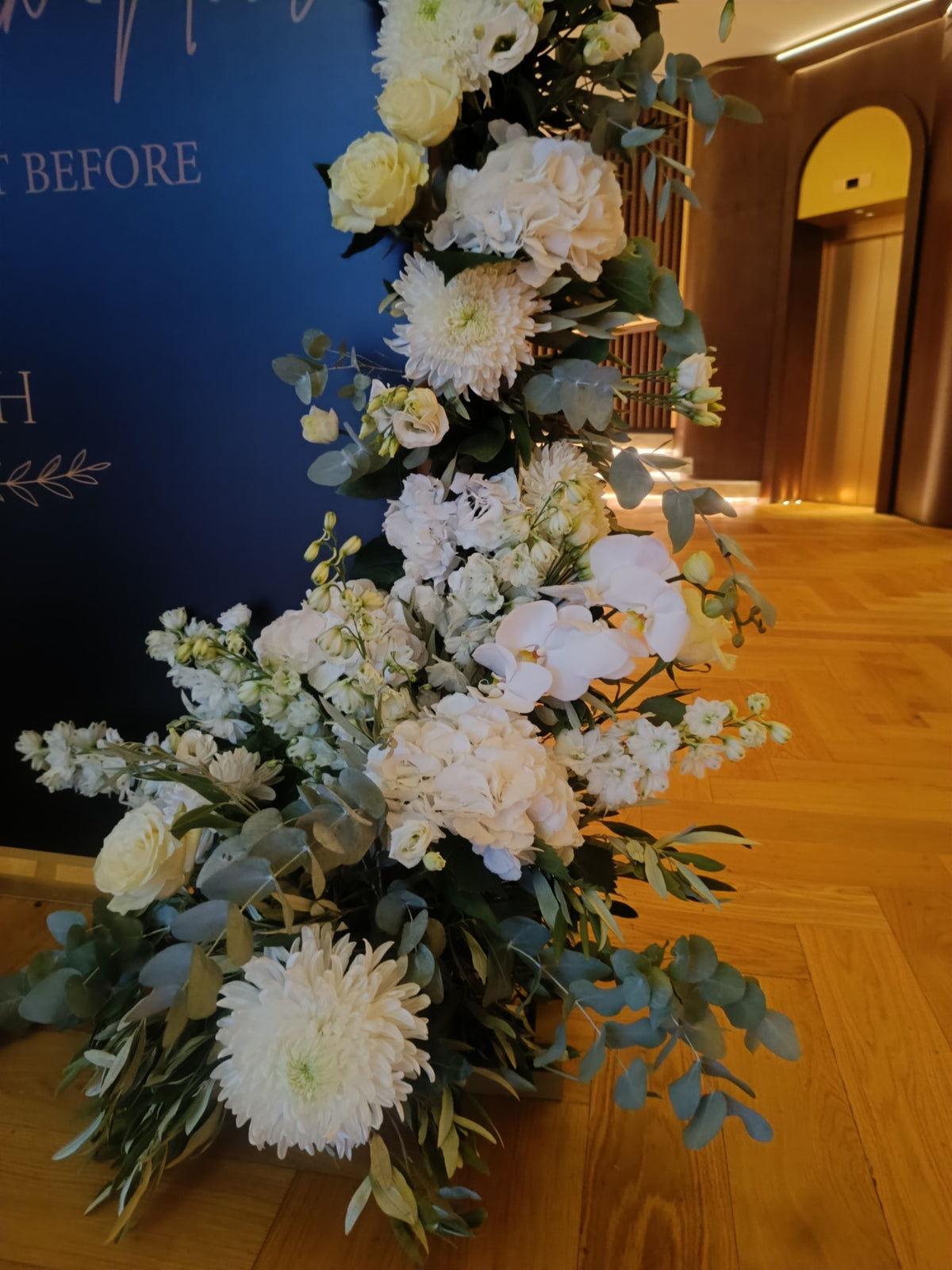 White orchid wedding floral installation for a luxury destination wedding in Greece